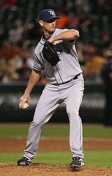 Grant Balfour partway through his pitching motion, wearing the Tampa Bay Rays road uniform in 2008.