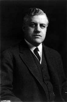 Chest and head of a middle-aged white male in a suit