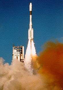 Ariane four rocket taking off past the tower