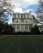 Photograph of the U.S. Marine Corps Commandant's House across the Barracks' parade ground.