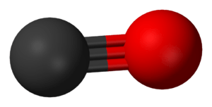 A carbon atom (shown as a grey ball) tripled bonded to an oxygen atom (shown as a red ball).