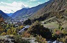 A photograph of Encamp, a small town among high mountains