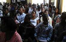An image of a seated crowd of students at a seminar in Enugu