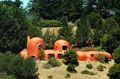 View of The Flintstone House from Eugene A. Doran Memorial Bridge on Interstate 280 (June 2007)