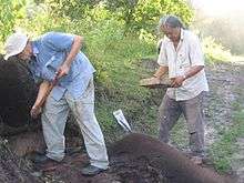 Photograph of George Simon at work in the Berbice Archaeology Project in 2009