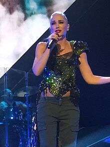 Gwen Stefani is performing live.