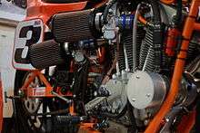 Close-up view of same V-twin racing motorcycle engine from the other, right-hand side