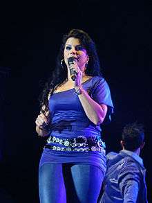 Tañón performing at a concert.