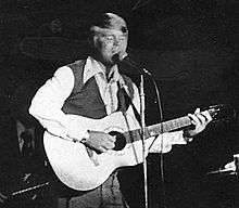 Glen Campbell plays an Ovation guitar.