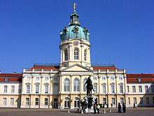 Domed palace against a brilliant blue sky