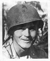 man wearing combat helmet