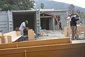 Heroic on-site refinishing of Saint Anne's pews