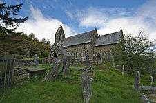 Stone-built church in a graveyard