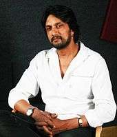 Sudeep looking at the camera