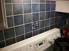 Picture of tiles above a kitchen stove