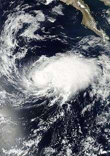 A visible satellite image of a tropical storm approaching hurricane intensity on August 31.