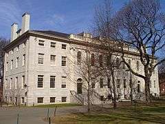 A large rectangular granite building, with two entrances on the long face.