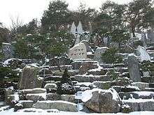 Cave rocks decorate the outdoor Rock Museum in Wolmyeongdong